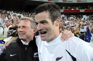 New Zealand coach Ricki Herbert, left, and captain Ryan Nelsen reacts after their team's 1-0 win over Bahrain in the World Cup qualifying playoff second leg soccer match at Westpac Stadium in Wellington, New Zealand, Saturday, Nov. 14, 2009. (AP Photo/NZPA, Ross Setford)